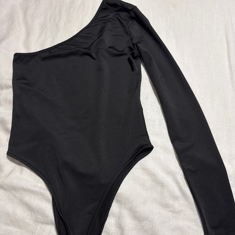 Black one sleeve bodysuit